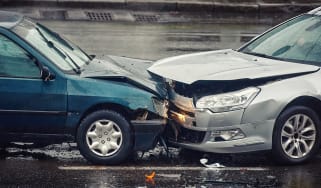 Two cars in a head-on collision